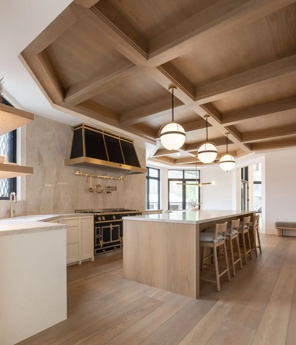 Custom timber ceiling beams in a modern kitchen, designed by Homestead Woodworks for architectural beauty